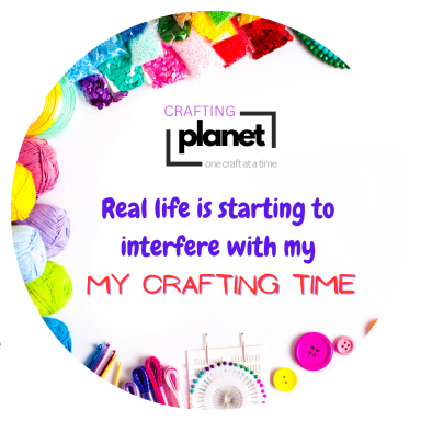 Colourful crafting supplies surround the text, "Real life is starting to interfere with my crafting time."