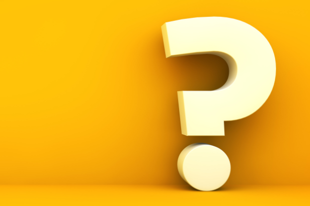 Yellow background with a large white question mark in the centre.